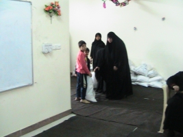 Sadr City Advice Centre distributes 64 food baskets to needy families in co-operation   